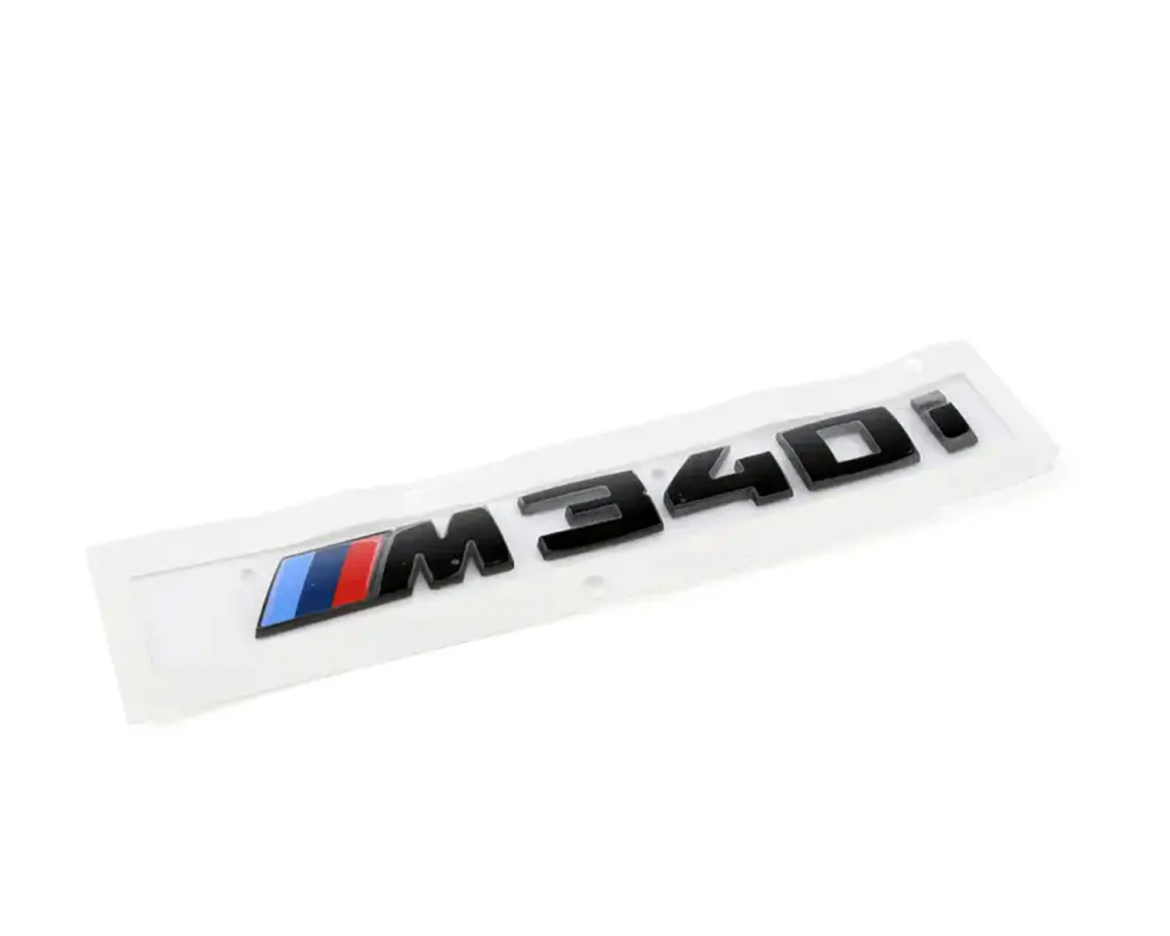 Monogramme de coffre "M340i" d'origine BMW M Performance en noir brillant