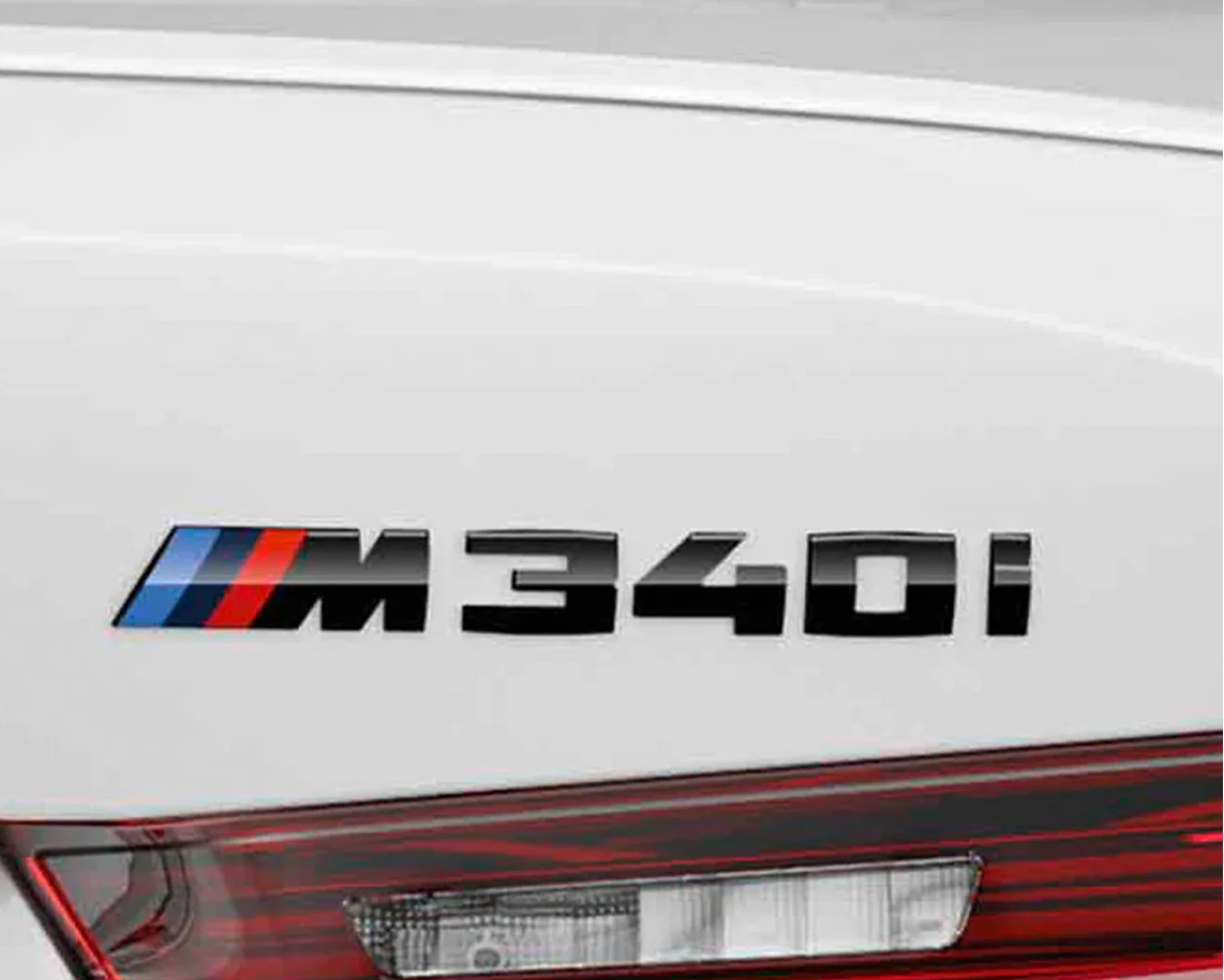 Monogramme de coffre "M340i" d'origine BMW M Performance en noir brillant